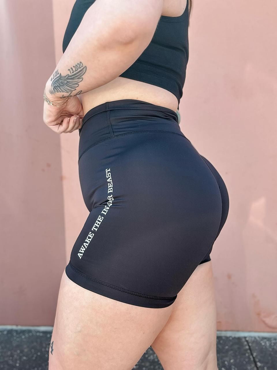 Black workout set side view