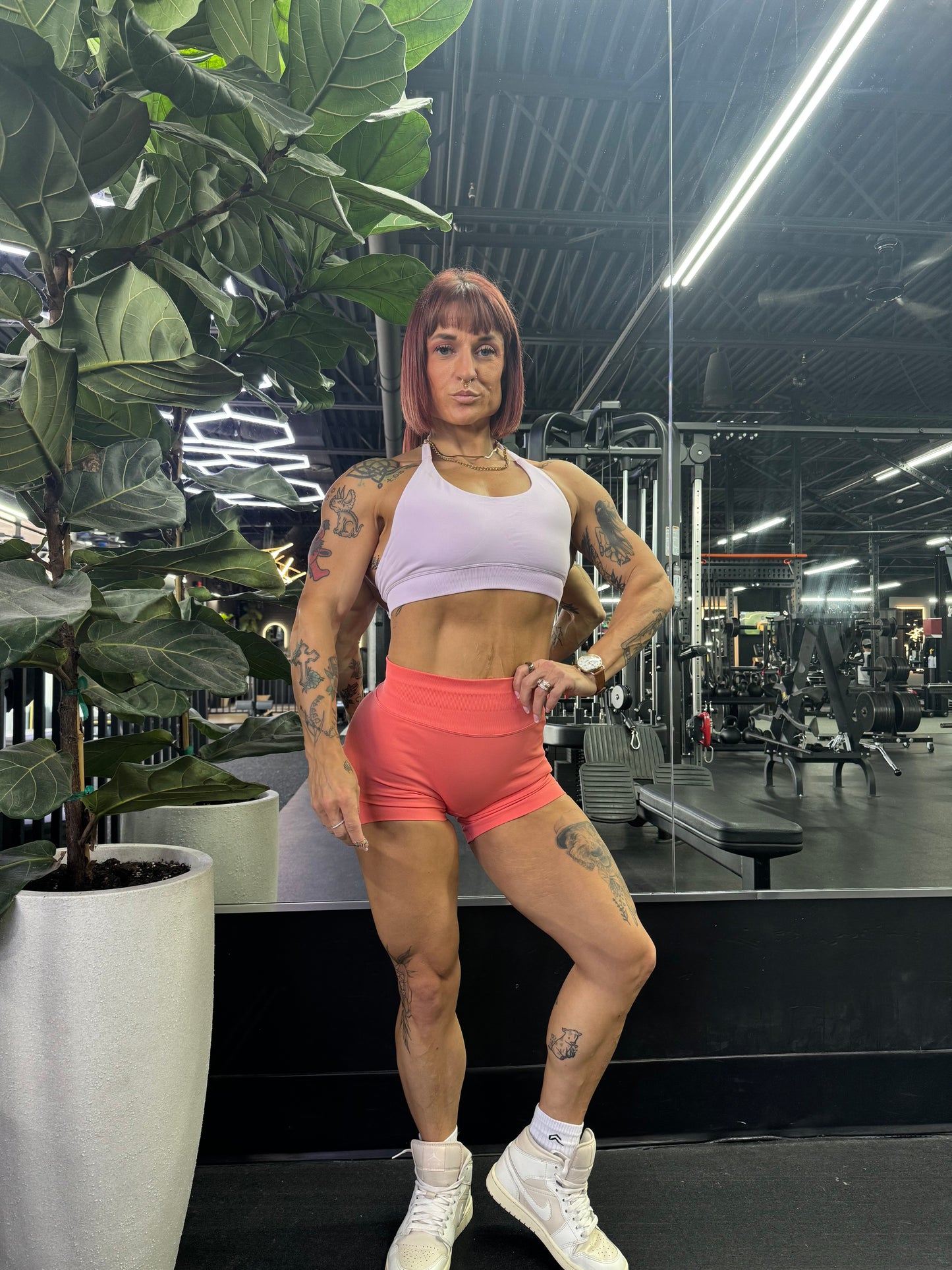 Modeling wearing seamless sports bra and seamless shorts