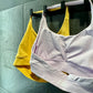 Congo Strength Shoppe seamless sports bras in white and yellow