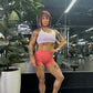Modeling wearing seamless sports bra and seamless shorts
